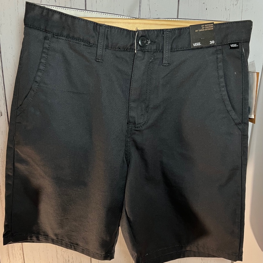 Vans grey shorts.